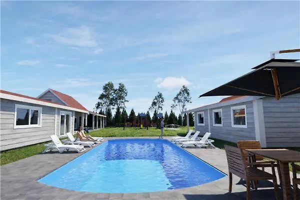 Дом отдыха Mazurskie Wzgorze -domki Z Basenem